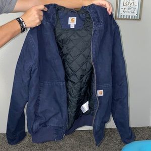 Navy Blue Carhart Hooded quilt lined Jacket.  Great used condition. Size Large.